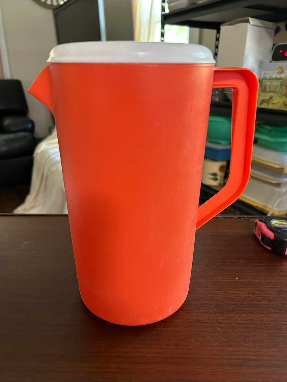 Vintage Rubbermaid 2 1/4 drink pitcher in classic 70s burnt orange. Very handy.